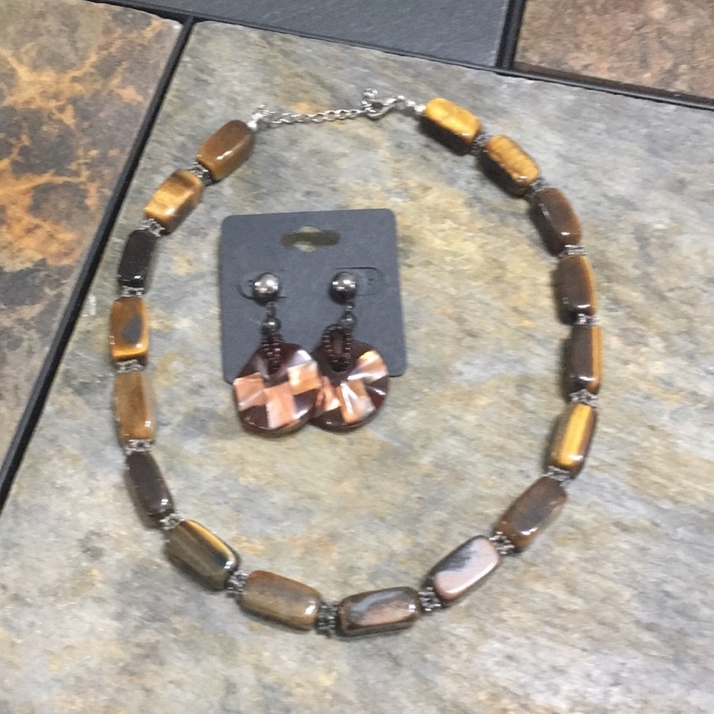 Necklace and earrings. New